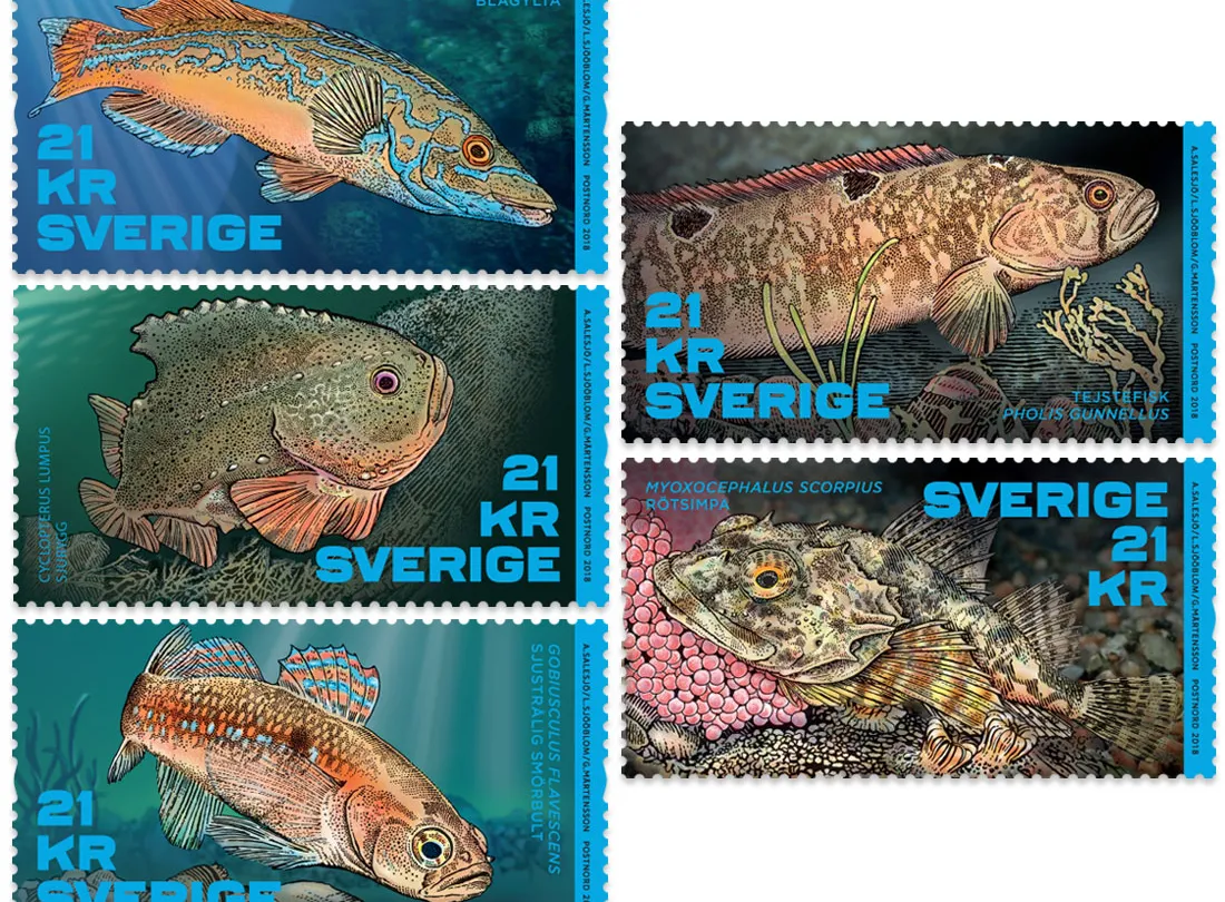 Frimärken med motiv fiskar.